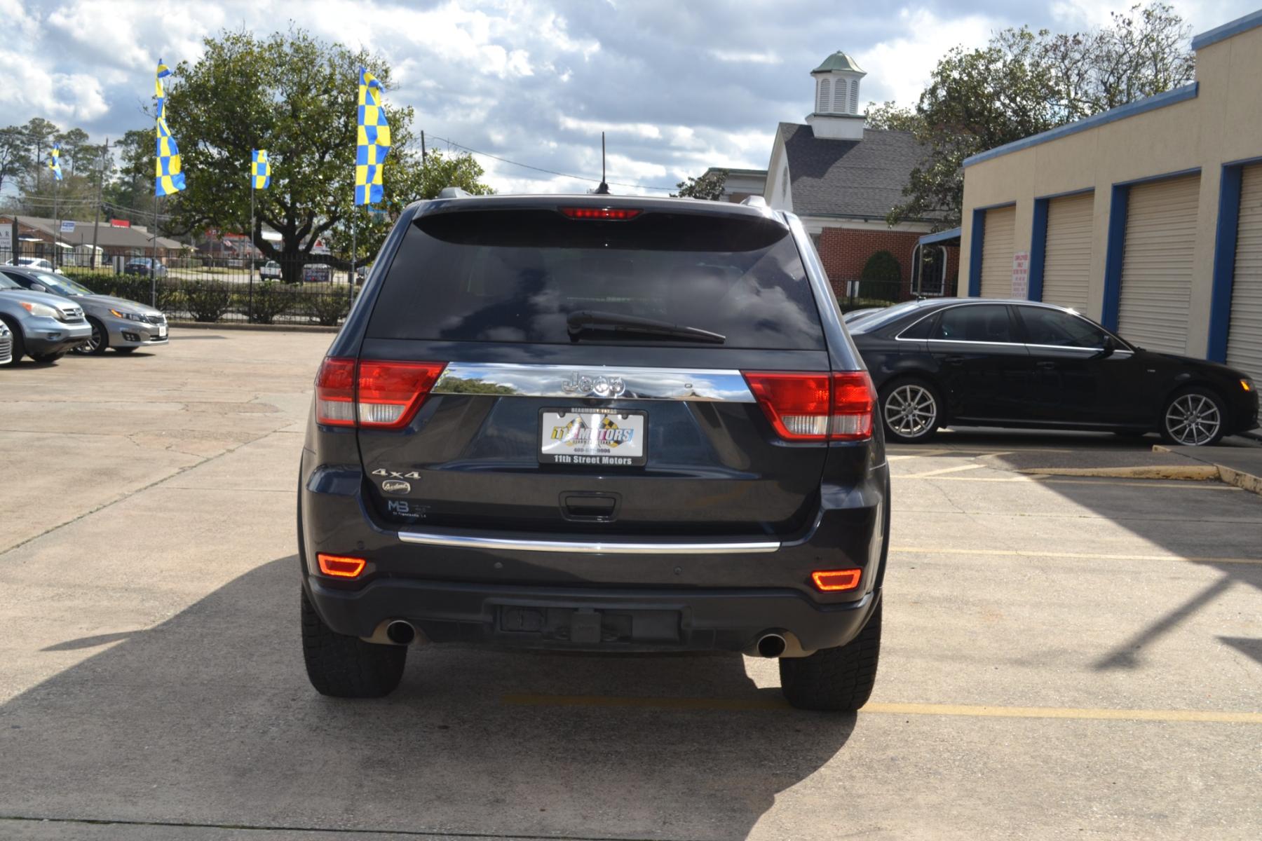 2013 Mineral Gray Metallic /Black Leather Interior Jeep Grand Cherokee Overland 4WD (1C4RJFCT1DC) with an 5.7L V8 OHV 16V engine, 5-Speed Automatic transmission, located at 1355 North 11th Street, Beaumont, 77702, (409) 832-0006, 30.094290, -94.130096 - Photo #3